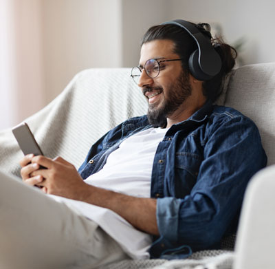 Listening to a podcast - Littleton Coin Blog